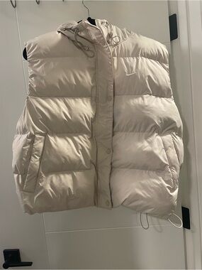Nike Women's Hooded Puffer Vest in Light Beige